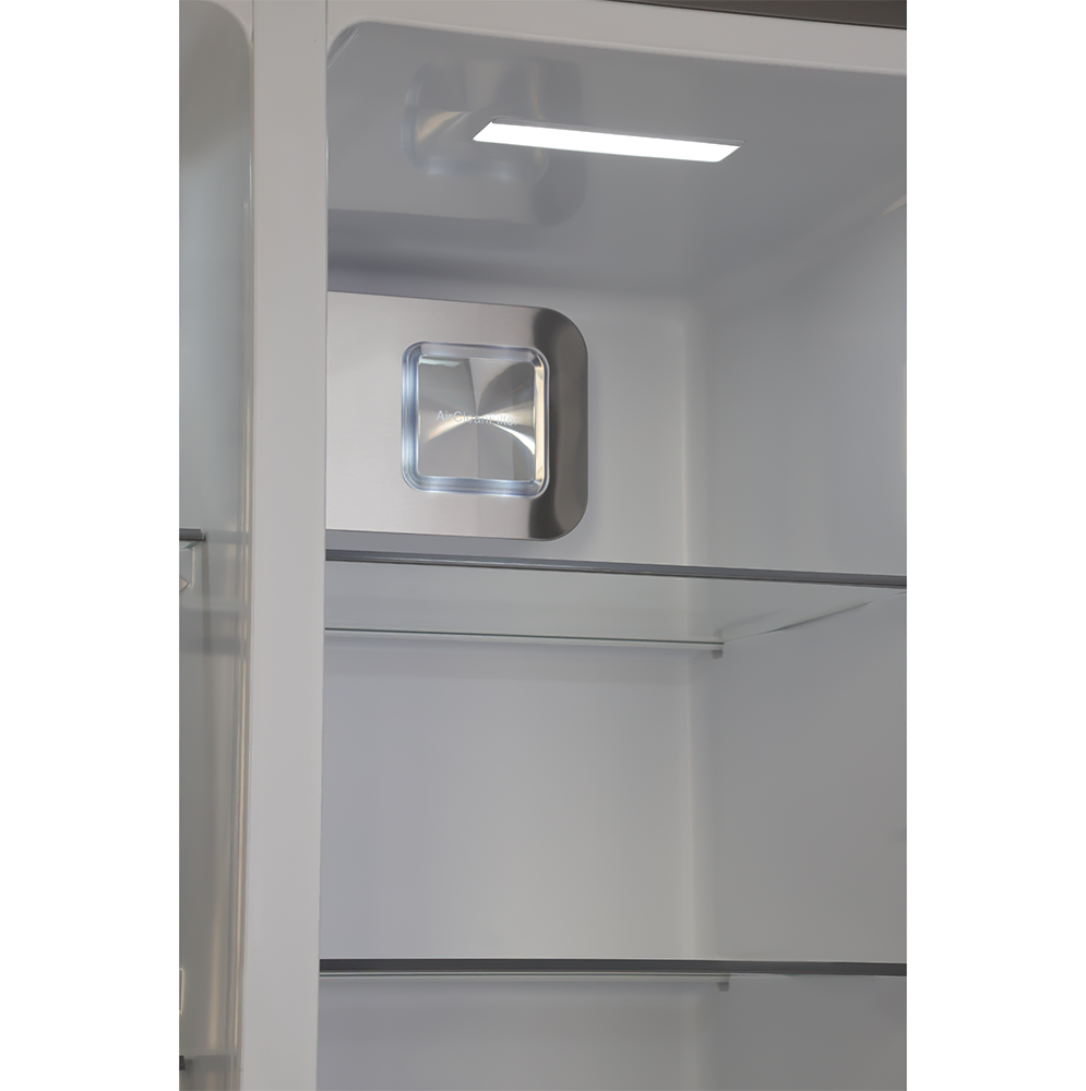 Close-up of a refrigerator interior with a light on