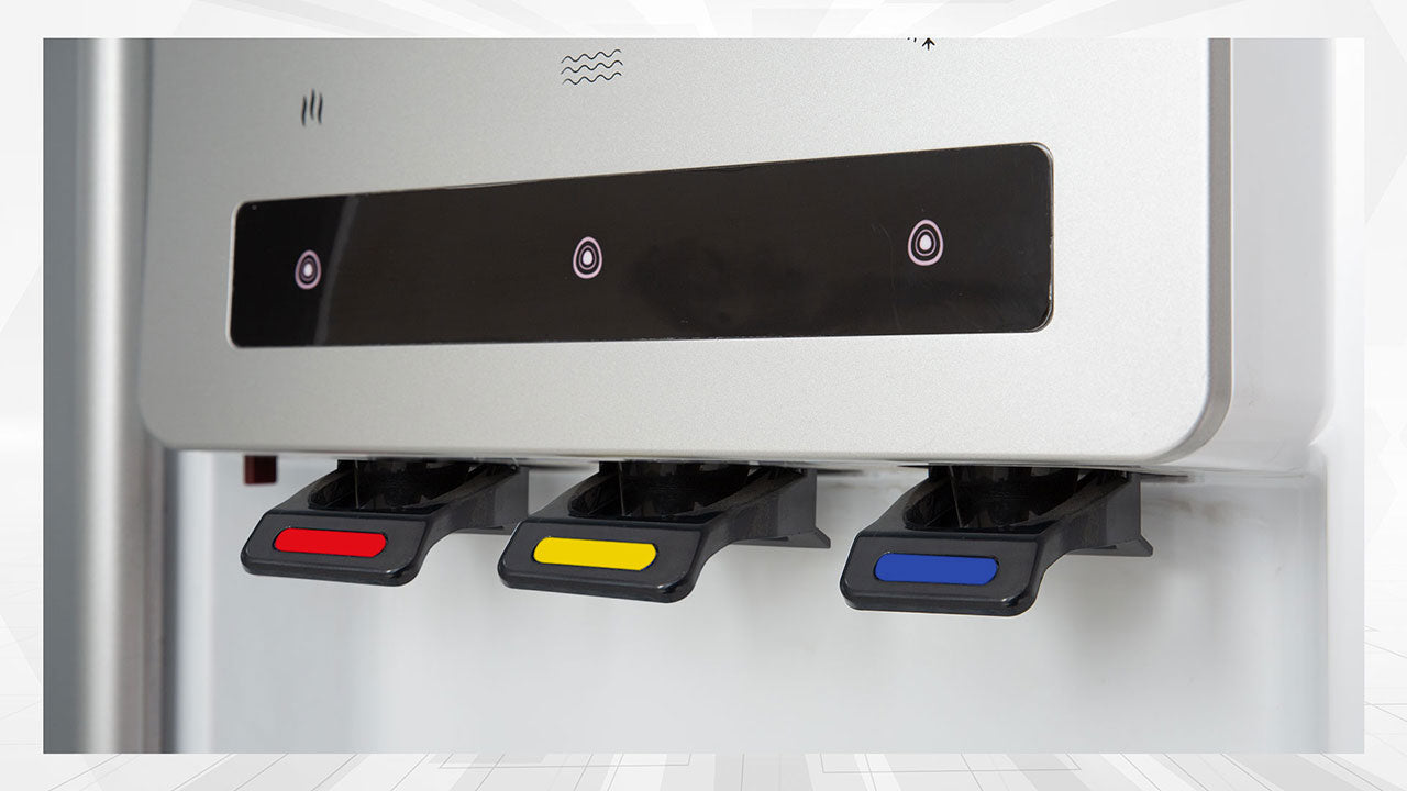 Close-up of Dawlance Water Dispenser 
-1060 hot and cold water taps